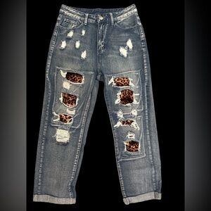 Boutique animal print patchwork distressed jeans
Size 29 (size 8)